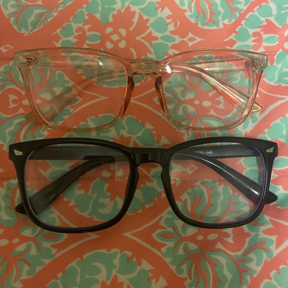 two pairs of blue light glasses